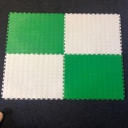 green-and-white-interlocking-rubber-mats