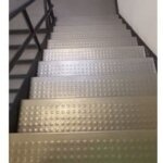 black-pvc-floor-mat-on-the-stairs